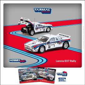 Lancia  - 037 Rally 1983 white/red/blue - 1:64 - Tarmac - T64P-TL002-83RMC01 - TC-T64P-TL002-83RMC01 | Toms Modelautos