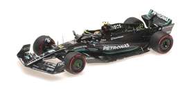 Mercedes Benz AMG - W14 2023 black/green - 1:43 - Minichamps - 417230844 - mc417230844 | Toms Modelautos